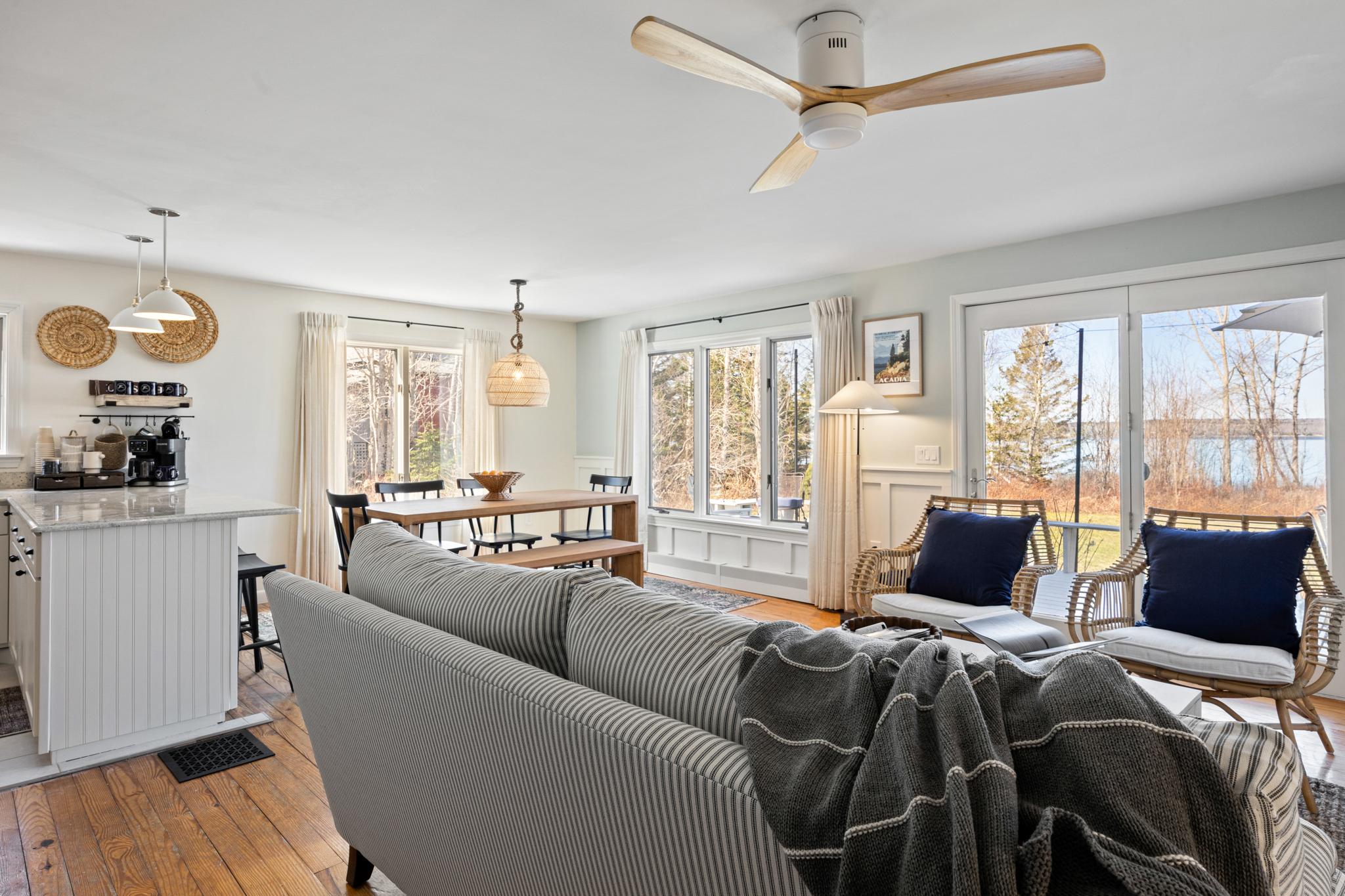 Open great room with coastal decor at Eagles Nest