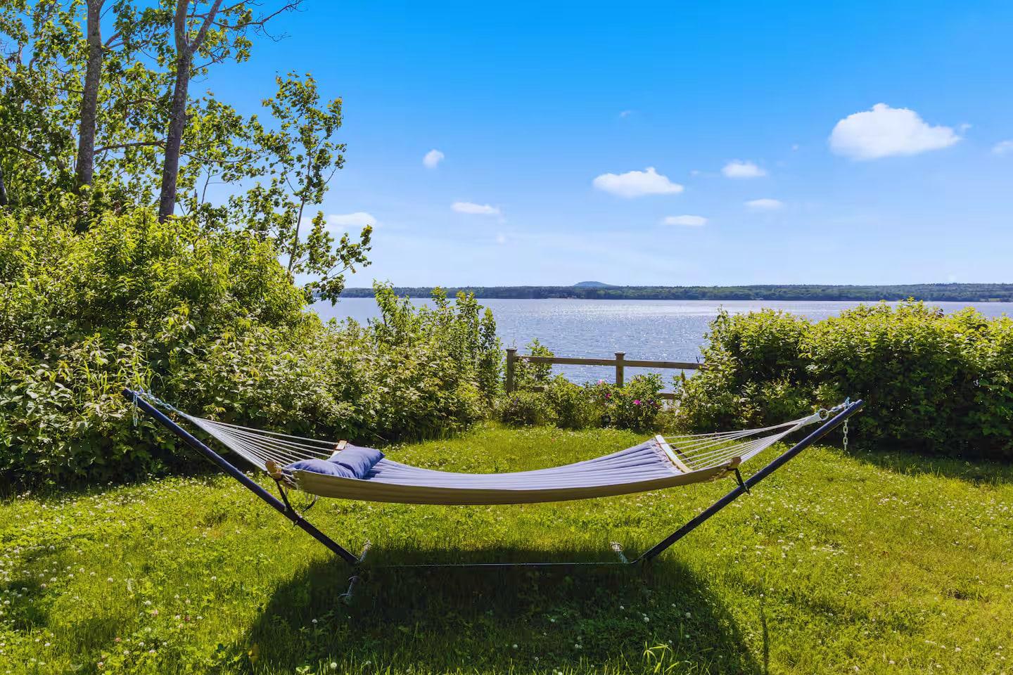 Hammock on the summer lawn facing the bay at Eagles Nest