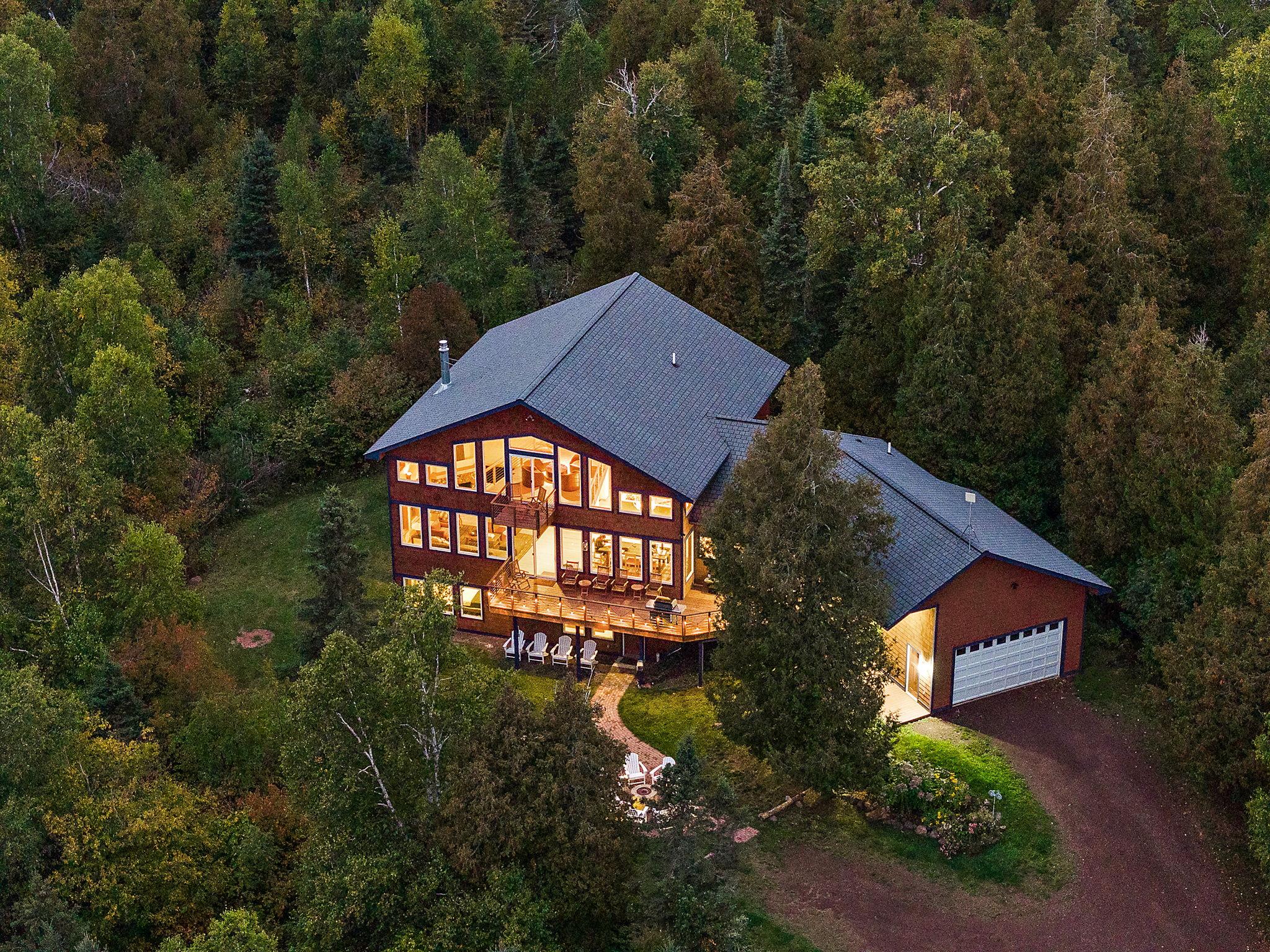 Nordhus Lodge and grounds at summer dusk near Lutsen