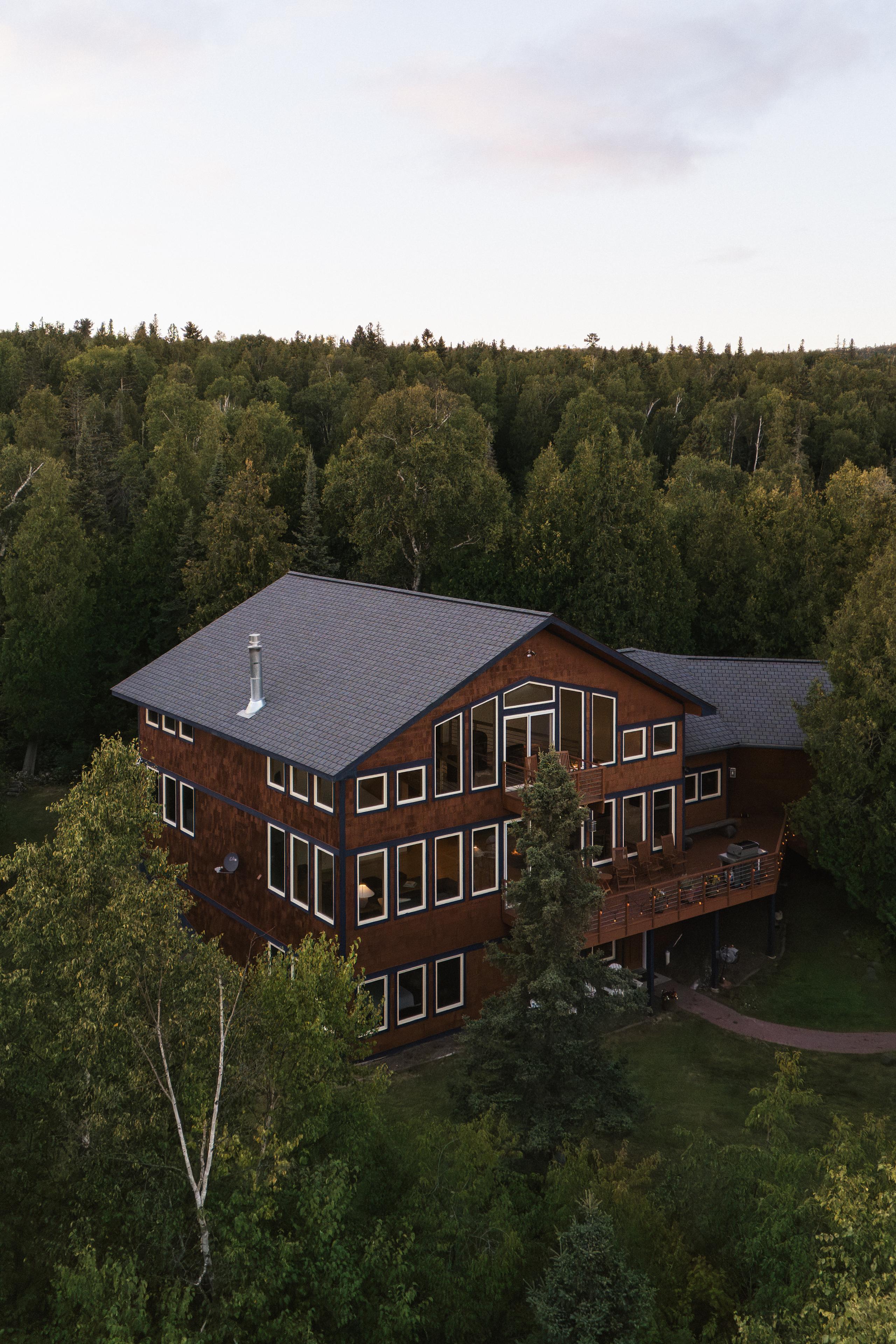 Nordhus Lodge among wooded acres above Lake Superior's North Shore, from the air