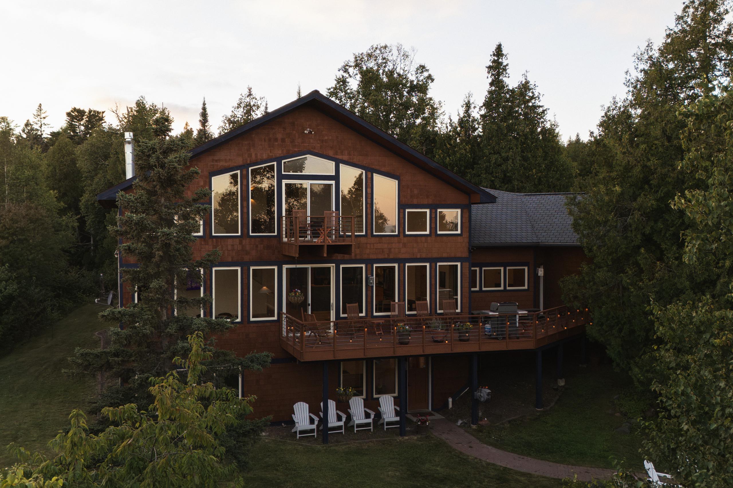 Nordhus Lodge and the North Shore forest in golden evening light